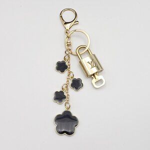 Authentic Louis Vuitton Lock & Key with Unbranded Flower Charm, Keychain